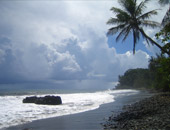 Tahiti's black-sand beaches on a South Pacific cruise